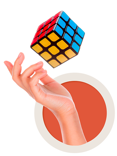 Imagem de uma mão com um cubo mágico